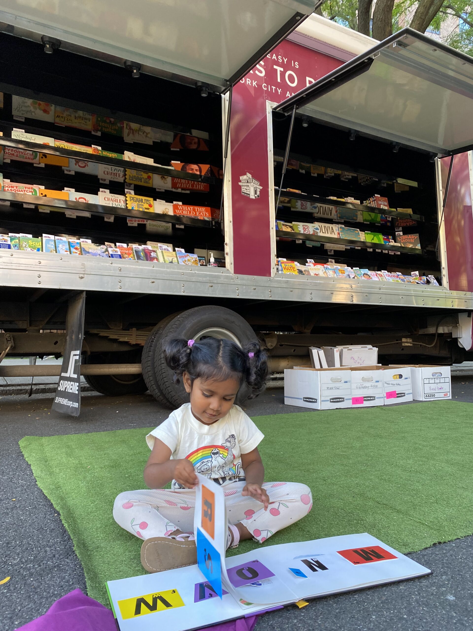 Child Reading on Touch a Truck Day